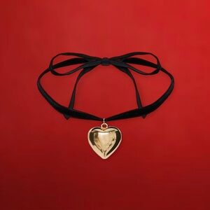 Vintage 90s black velvet choker with chunky gold heart pendant